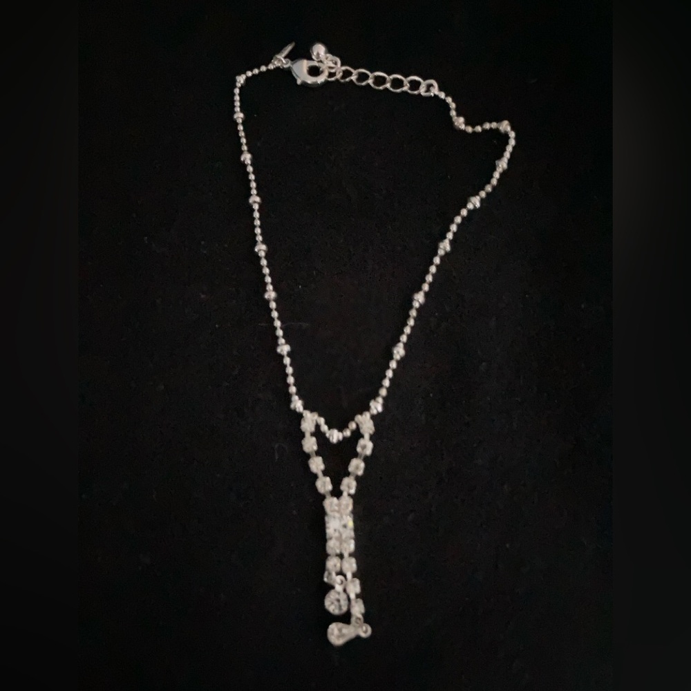 Lovely NIB rhinestone anklet from Avon. Brand new.